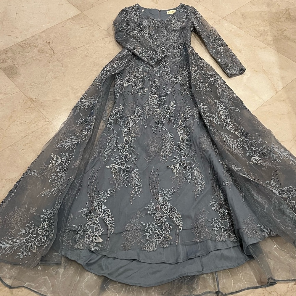 Lara lace long sleeve gown with overskirt